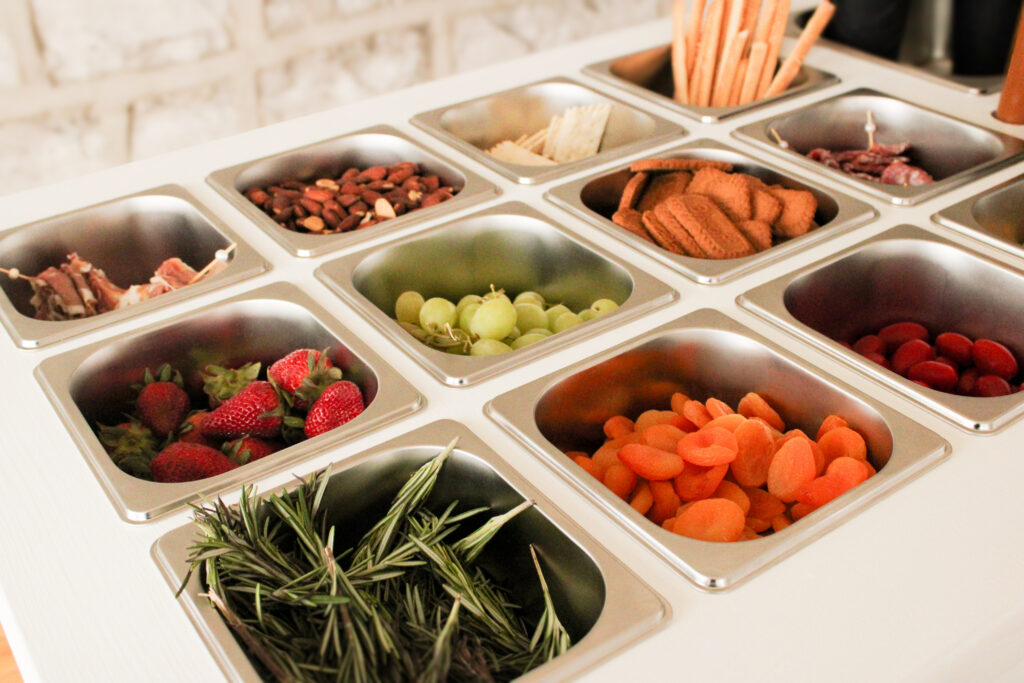 Charcuterie cart filled with different types of food during a brand shoot at a studio in Kingston, Ontario.